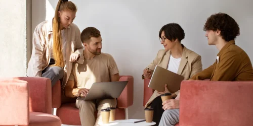 people-discussing-at-work-side-view